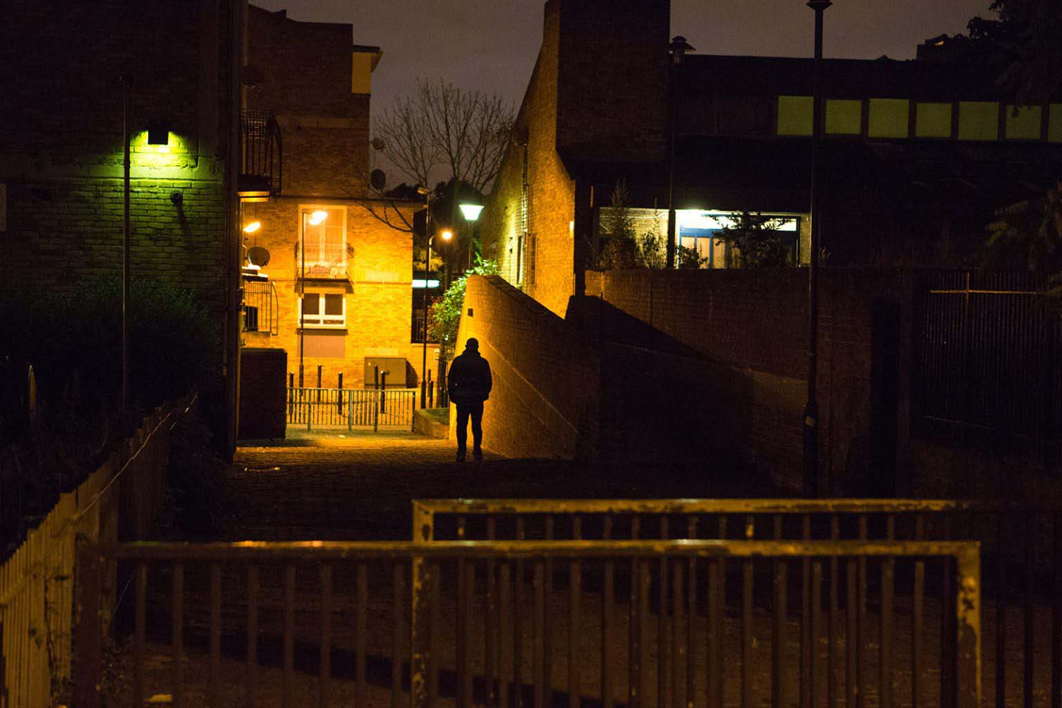 Photograph of street alleyway with lighting